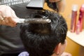 Drying hair at hairdresser Royalty Free Stock Photo