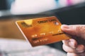 A hand holding and giving credit card Royalty Free Stock Photo