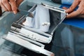 Pharmacist prepare pills in qualified counting tray by prescription at drugstore