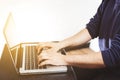 Closeup image of hands using and typing on laptop Royalty Free Stock Photo