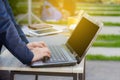 Closeup image of a hands working and typing on laptop keyboard. Royalty Free Stock Photo