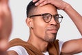 Closeup image of handsome African American young man smiling, wearing eyewear, looking at the camera and taking self portrait Royalty Free Stock Photo