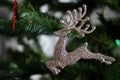 Christmas tree toys and decorations. Golden reindeer.