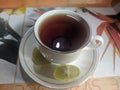 Closeup image of lime tea in a cup