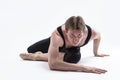 Closeup Image of Male Ballerino Dancer While Practising Stretching Exercices In Black Sportive Tights in Studio Royalty Free Stock Photo