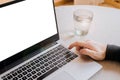 Closeup image of a man finger pressing on the enter button of laptop computer on the table. space for text. telework Royalty Free Stock Photo