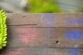 Close up detail of green mop on wooden background Royalty Free Stock Photo