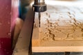 Close up milling machine processes wood Royalty Free Stock Photo