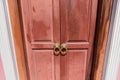 CloseUp image of old door with circle iron door-handle.Phuket.Thailand Royalty Free Stock Photo