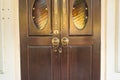 CloseUp image of old door with circle iron door-handle.Phuket.Thailand Royalty Free Stock Photo
