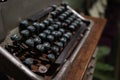 A closeup image of an old vintage type writer with eroded keys with selective focus on A S D W keys and background blur Royalty Free Stock Photo