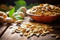 closeup image of raw pumpkin seeds on a wooden table Royalty Free Stock Photo