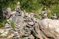 Closeup image of rocks delicately balanced against each other in a precarious position