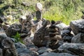 Closeup image of rocks delicately balanced against each other in a precarious position