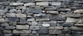 a close up of a stone wall made of different types of rocks Royalty Free Stock Photo