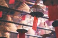 Spiral incenses hanging from the ceiling in Chinese temple