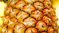 Closeup photo of tasty ripe pineapple cut in halves. Abstract background of exotic fruits. Royalty Free Stock Photo