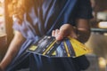 A woman holding and showing credit cards Royalty Free Stock Photo