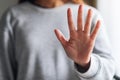 A woman outstretched hand and showing stop hand sign or number five hand sign Royalty Free Stock Photo