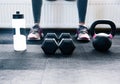 Closeup image of a woman sitting at gym