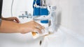 Closeup photo of young woman washing sink in bathroom Royalty Free Stock Photo