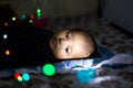 Closeup of Indian Baby with colorful bokeh Royalty Free Stock Photo