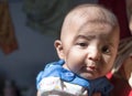 Closeup of Indian Baby girl gazing at camera Royalty Free Stock Photo