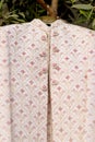 Closeup of an Indian embroidered wedding dress