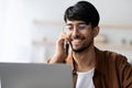 Closeup of indian guy freelancer working from home Royalty Free Stock Photo