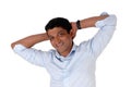 Closeup on a Indian man hands behind his head Royalty Free Stock Photo