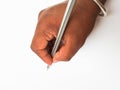 Indian Man writing using Pencil in a hand on white paper Royalty Free Stock Photo