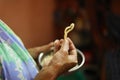 Closeup Indian woman hand holding traditional snack murukku