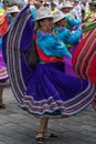 Closeup of an indigenous young woman dancing in the street