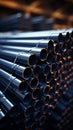 Closeup of an industrial pile of steel pipes, neatly stacked