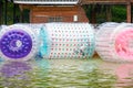 Closeup of an inflatable roller game in a water playground Royalty Free Stock Photo