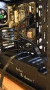 Closeup gaming PC tower with motherboard installed inside and slogan - Be cool, Be gamer