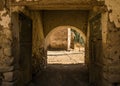 Closeup of an inside view of an archeological site in Peru with and arched enterance