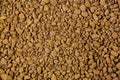 Closeup instant coffee. Granule golden roasted soluble coffee Royalty Free Stock Photo