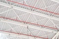 closeup of interior industrial hangar white steel roof structure Royalty Free Stock Photo