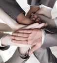 Closeup.international business team showing their unity. Royalty Free Stock Photo