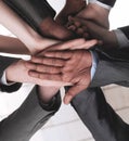 Closeup.international business team showing their unity. Royalty Free Stock Photo