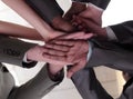 Closeup.international business team showing their unity. the concept of teamwork. Royalty Free Stock Photo