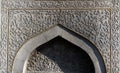 Closeup of Islamic floral carving patterns on marble