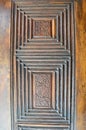 Closeup of islamic ornaments of an old an aged decorated wooden door