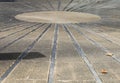 Closeup of isolated concrete ground with circle and symmetrical geometric lines focus on center