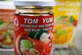 Closeup of isolated glass with thai hot and sour tom yum seasoning paste