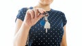 Closeup isolated photo of young real estate agent showing keys from new house Royalty Free Stock Photo