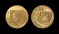 Closeup of Israel ten agorot coins on a dark background