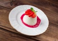 Closeup italian dessert Pannacotta with strawberries
