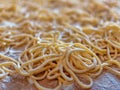 Closeup Italian Homemade uncooked pasta on wooden board top view
